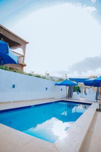 Bazén v ubytování Tunis Oasis 4 Bedrooms private villa with private pool nebo v jeho okolí