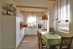Køkken eller tekøkken på Spreewald Ferienhaus Bludniki