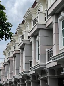 a building with balconies on the side of it at Entire 3BR Townhome in Sukhumvit, shared Pool, near BTS&MRT Asok in Bangkok