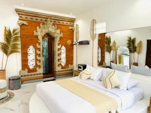 Postel nebo postele na pokoji v ubytování Pillow Inn Ubud + 37 fotografií
