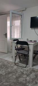 TV a/nebo společenská místnost v ubytování Fontana Apartman