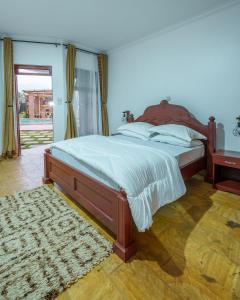 Ένα ή περισσότερα κρεβάτια σε δωμάτιο στο Sprunger Avenue - tulia homes