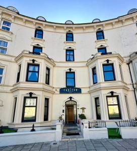 a large building with a door in front of it at The Carlton's Holiday Suites in Bridlington