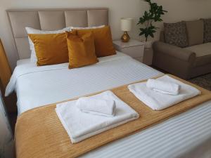 Ліжко або ліжка в номері Stan na dan Golden apartman