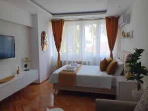 Ліжко або ліжка в номері Stan na dan Golden apartman