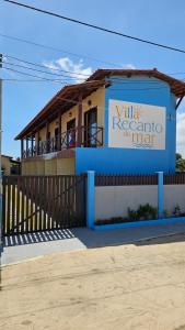 Un bâtiment avec un panneau indiquant la villa régtta no man dans l'établissement Villa Recanto do Mar - Icaraizinho de Amontada, à Amontada