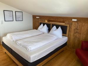 Postel nebo postele na pokoji v ubytování Schwarzenbergerhof