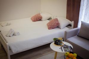 Postel nebo postele na pokoji v ubytování Apartman Rest
