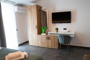 TV a/nebo společenská místnost v ubytování New River Hotel
