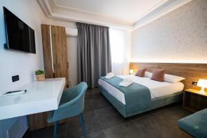 Postel nebo postele na pokoji v ubytování New River Hotel