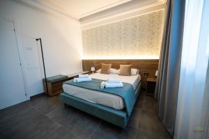 Postel nebo postele na pokoji v ubytování New River Hotel
