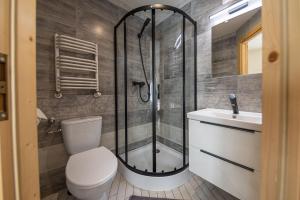 Kúpeľňa v ubytovaní Apartamenty i pokoje gościnne Wajdówka