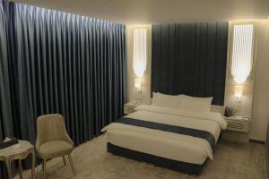 Postelja oz. postelje v sobi nastanitve Rival Hotel Amman