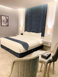 Postel nebo postele na pokoji v ubytování Rival Hotel Amman