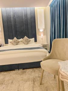 Postel nebo postele na pokoji v ubytování Rival Hotel Amman