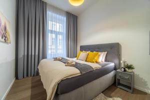 Katil atau katil-katil dalam bilik di A Prague Apartments - Lesser Town