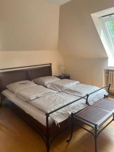 Postel nebo postele na pokoji v ubytování Dünenhaus 2 Schlafzimmer