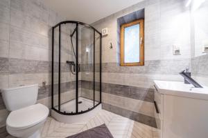 Kúpeľňa v ubytovaní Apartamenty i pokoje gościnne Wajdówka