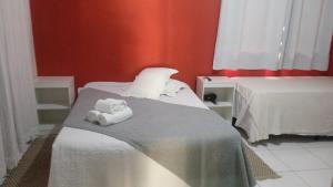Ένα ή περισσότερα κρεβάτια σε δωμάτιο στο Apartamento Alto Mucugê
