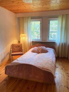 Postel nebo postele na pokoji v ubytování Cozy home in Tallinn