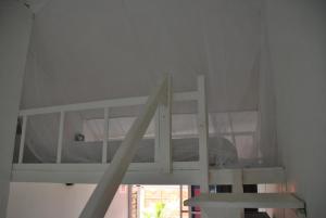 Bunk bed o mga bunk bed sa kuwarto sa +221 Lagune Beach House