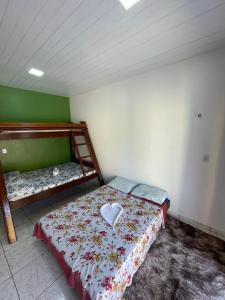 Katil atau katil-katil dalam bilik di Pousada Sossego de Alter