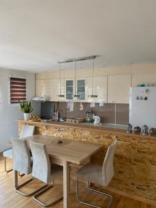 Η κουζίνα ή μικρή κουζίνα στο Apartman Meri