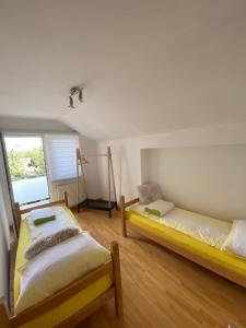 Ένα ή περισσότερα κρεβάτια σε δωμάτιο στο Apartman Meri