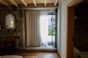 Cama ou camas em um quarto em Quinta de São Francisco Houses