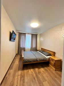 Postel nebo postele na pokoji v ubytování Eco Apartments Melnyka10