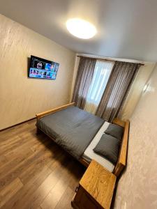 Postel nebo postele na pokoji v ubytování Eco Apartments Melnyka10