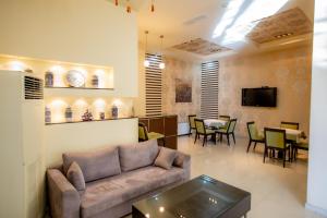 TV a/nebo společenská místnost v ubytování Giannis Hotel