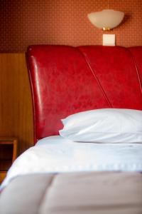 Postel nebo postele na pokoji v ubytování Giannis Hotel