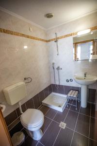 Koupelna v ubytování Giannis Hotel