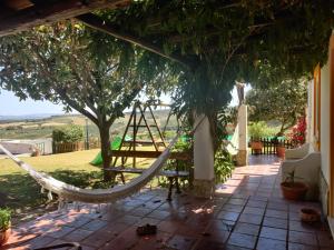Um jardim no exterior de Casal Serrano Charme e Tranquilidade