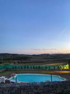 A piscina em ou perto de Casal Serrano Charme e Tranquilidade