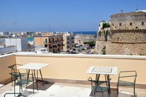 En balkon eller terrasse på Cala Dei Normanni - Camere sulle Mura