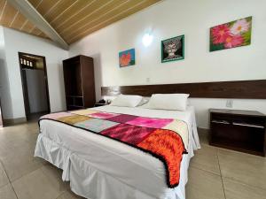 Postel nebo postele na pokoji v ubytování Hotel Fazenda Triunfo
