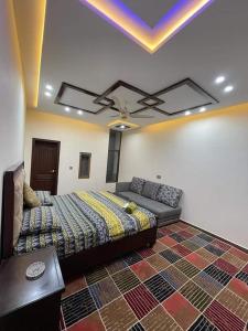 Кровать или кровати в номере vista guest house