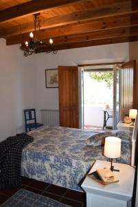 Uma cama ou camas num quarto em Casal Serrano Charme e Tranquilidade