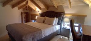 A bed or beds in a room at Abi Luxury Villas