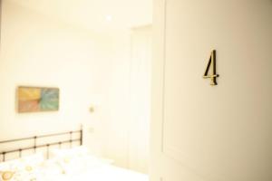 A bed or beds in a room at Affittacamere Arosio