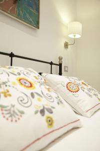 A bed or beds in a room at Affittacamere Arosio