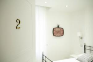 A bed or beds in a room at Affittacamere Arosio