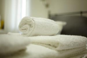 A bed or beds in a room at Affittacamere Arosio