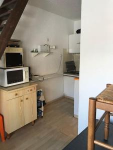 Η κουζίνα ή μικρή κουζίνα στο Studio Duplex Pra Loup 1500