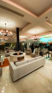 A seating area at RAW BEACH HOTEL