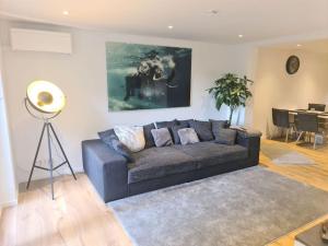 Posezení v ubytování Kernsan. Souterrain-Wohnung 60qm mit Pool Blick