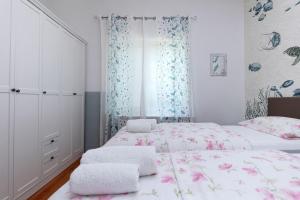 Postel nebo postele na pokoji v ubytování Vila Lavanda