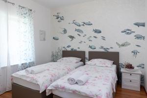 Postel nebo postele na pokoji v ubytování Vila Lavanda